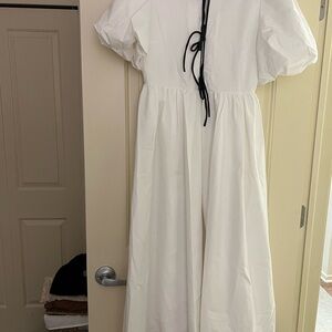 Luxe White Blouse with Black Trim